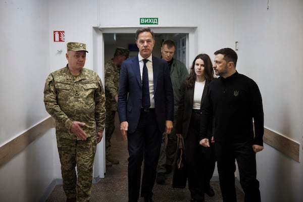 In this photo provided by the Ukrainian Presidential Press Office, NATO Secretary General Mark Rutte, center, and Ukraine's President Volodymyr Zelenskyy, right, visit a military hospital in Odesa, Ukraine, Tuesday, April 15, 2025.(Ukrainian Presidential Press Office via AP)