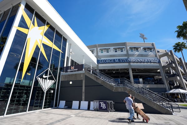 The Tampa Bay Rays logo is shown on the window of the souvenir shop outside George M. Steinbrenner Field during a stadium tour Wednesday, March 26, 2025, in Tampa, Fla. (AP Photo/Chris O'Meara)