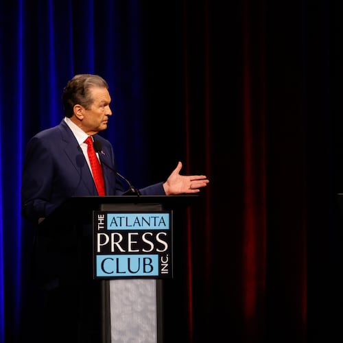Republican candidates for governor, Rick Jackson, left, and Lt. Gov. Burt Jones interact at the Atlanta Press Club Loudermilk-Young primary election debate at Georgia Public Broadcasting on Monday. (Arvin Temkar/AJC)