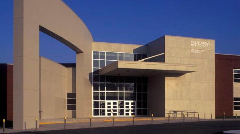 The victim was shot when he approached a person who was trying to break into his vehicle, which was parked on school property.