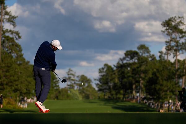 Scottie Scheffler hits his tee shot on the 14th hole during the second round at the Masters golf tournament, Friday, April 11, 2025, in Augusta, Ga. (AP Photo/David J. Phillip)