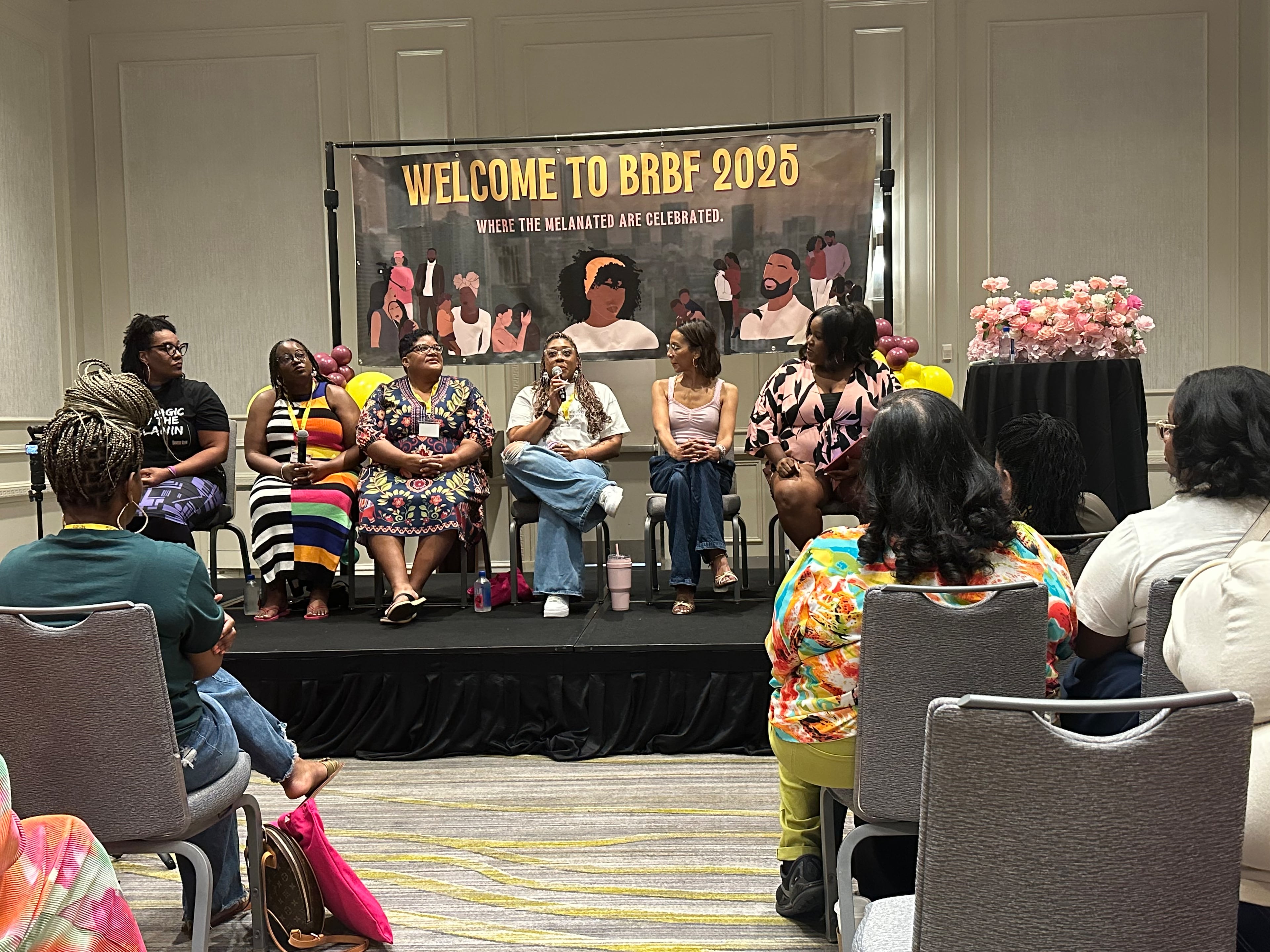 At the Black Romance Book Fest, writers tell fans how they craft the flirty dialogue in their novels. L to R: Danielle Allen, Kasha Thompson, Farrah Rochon, Natasha Bishop, Tia Williams and moderator, Jaleesa Jackson. (Nedra Rhone/AJC)