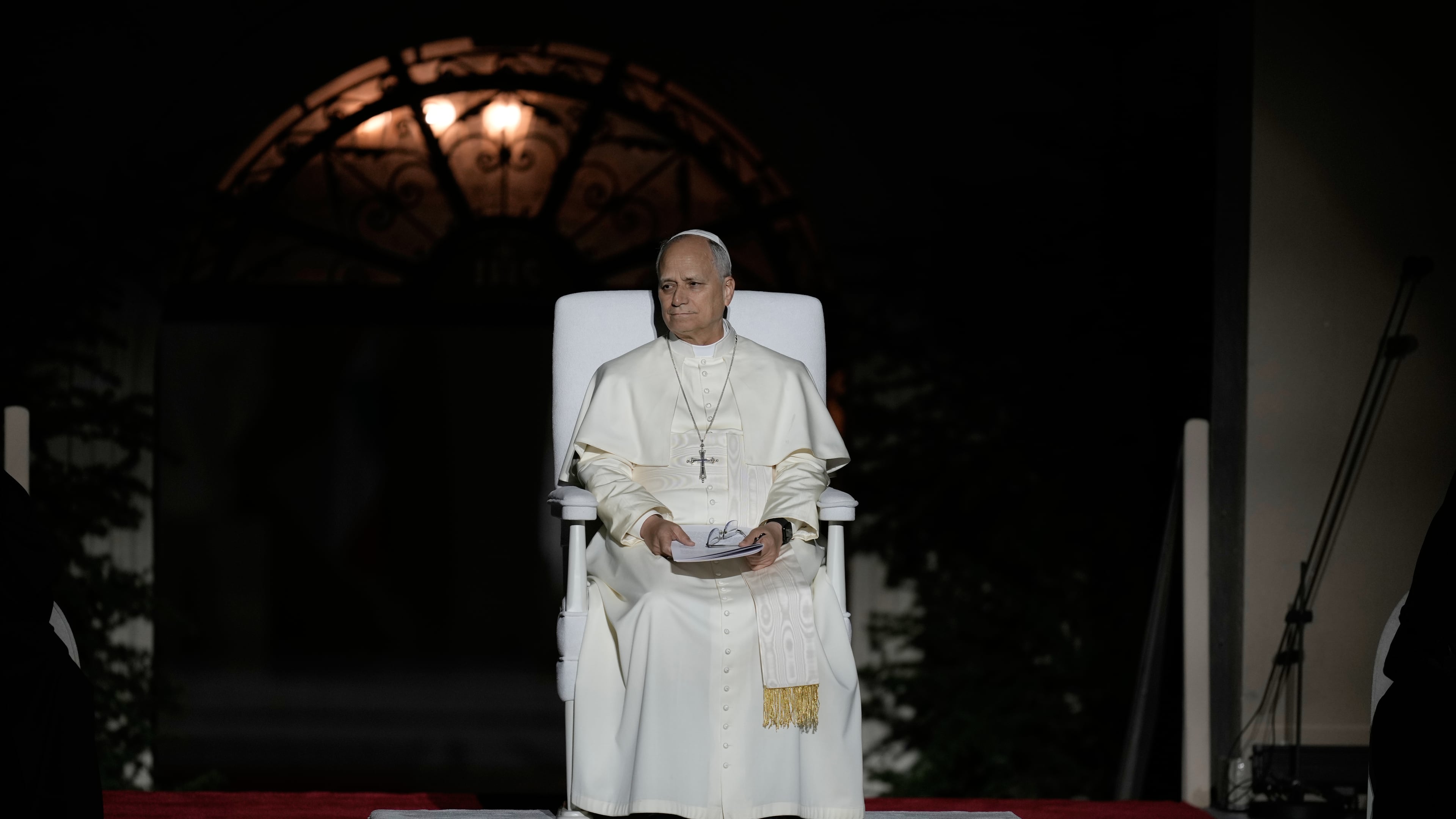 Pope Leo XIV sits onstage during a meeting with youths in Bkerki, the seat of the Maronite Church, in Lebanon, Monday, Dec. 1, 2025. (AP Photo/Bilal Hussein)