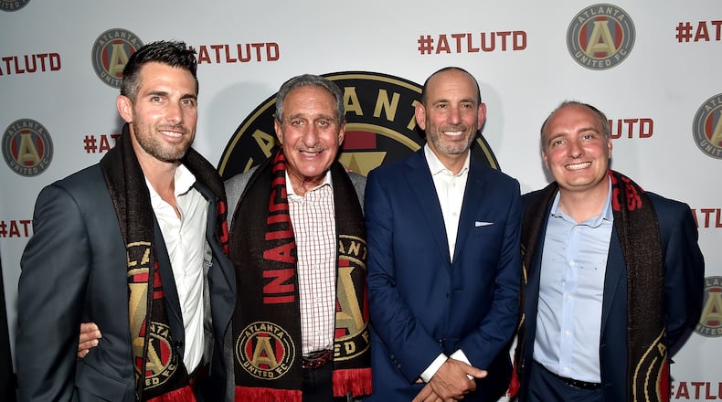 Atlanta United FC Technical Director Carlos Bocanegra, MLS Atlanta owner Arthur Blank, MLS Commissioner Don Garber, and Atlanta United FC President Darren Eales unveiled the team’s new logo on Tuesday . (Photo by Paras Griffin/Getty Images for MLS Atlanta)