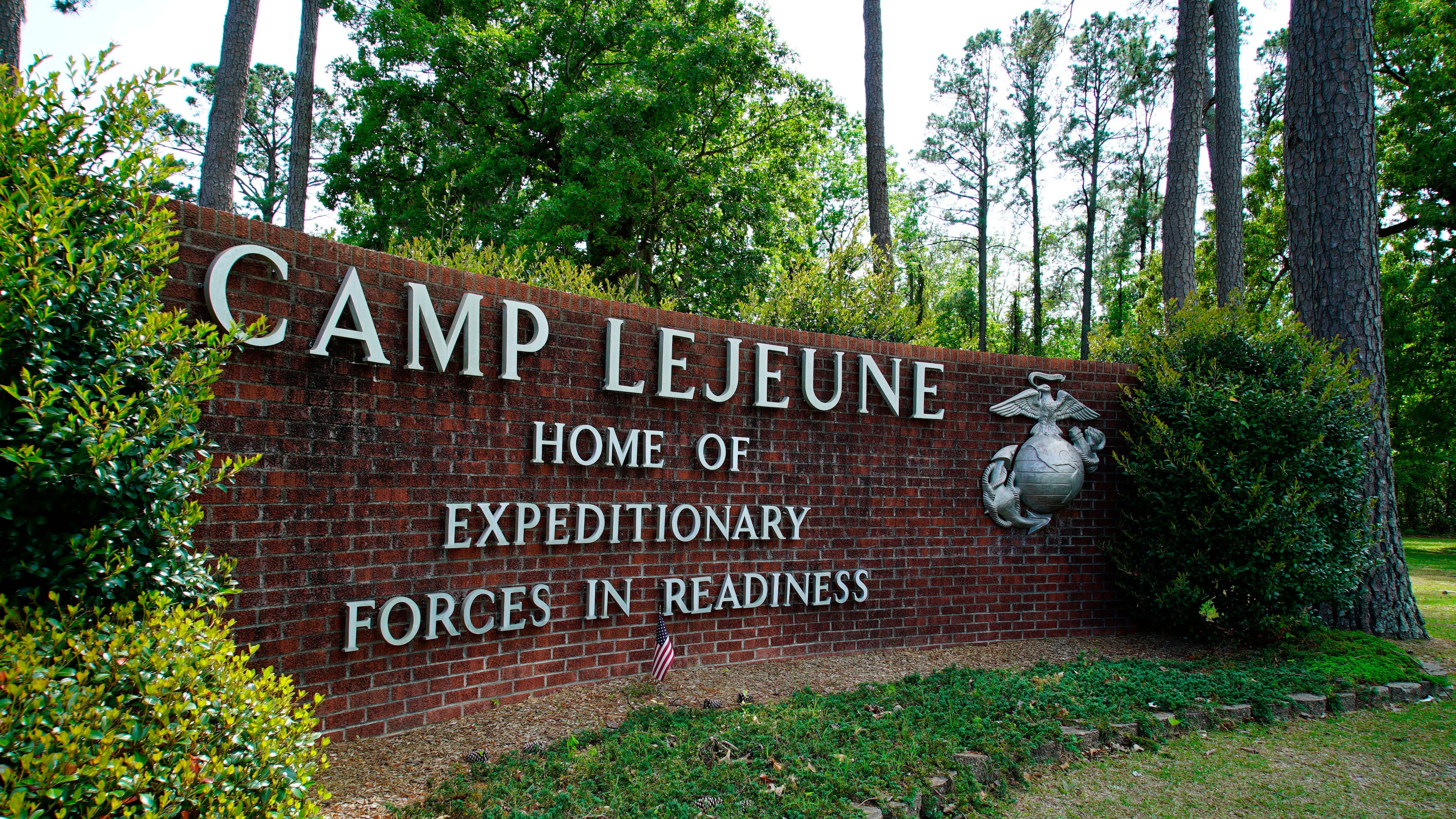 FILE - The main gate to Camp Lejeune Marine Base is seen outside Jacksonville, N.C., April 29, 2022. (AP Photo/Allen G. Breed, File)