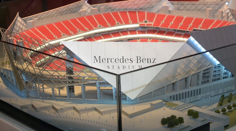 This model of Mercedes-Benz Stadium is in the Falcons’ stadium preview center. (KENT D. JOHNSON/kdjohnson@ajc.com)