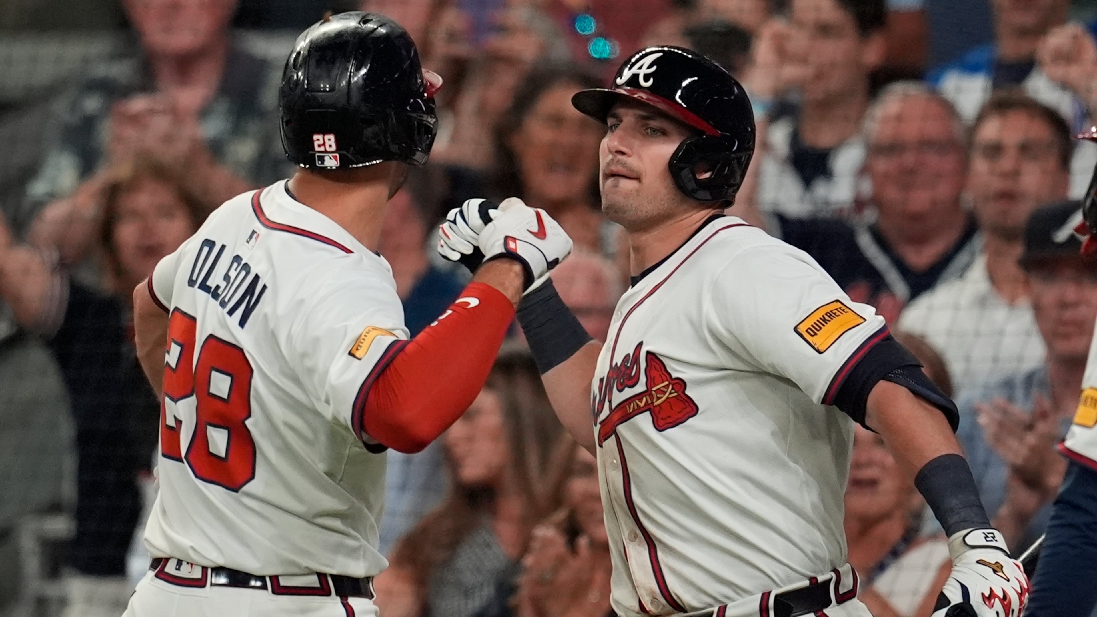 Atlanta Braves first baseman Matt Olson (28) celebrates his grand slam home run against the Los Angeles Angels in the sixth inning of a baseball game, Wednesday, July 2, 2025, in Atlanta. (AP Photo/Mike Stewart)