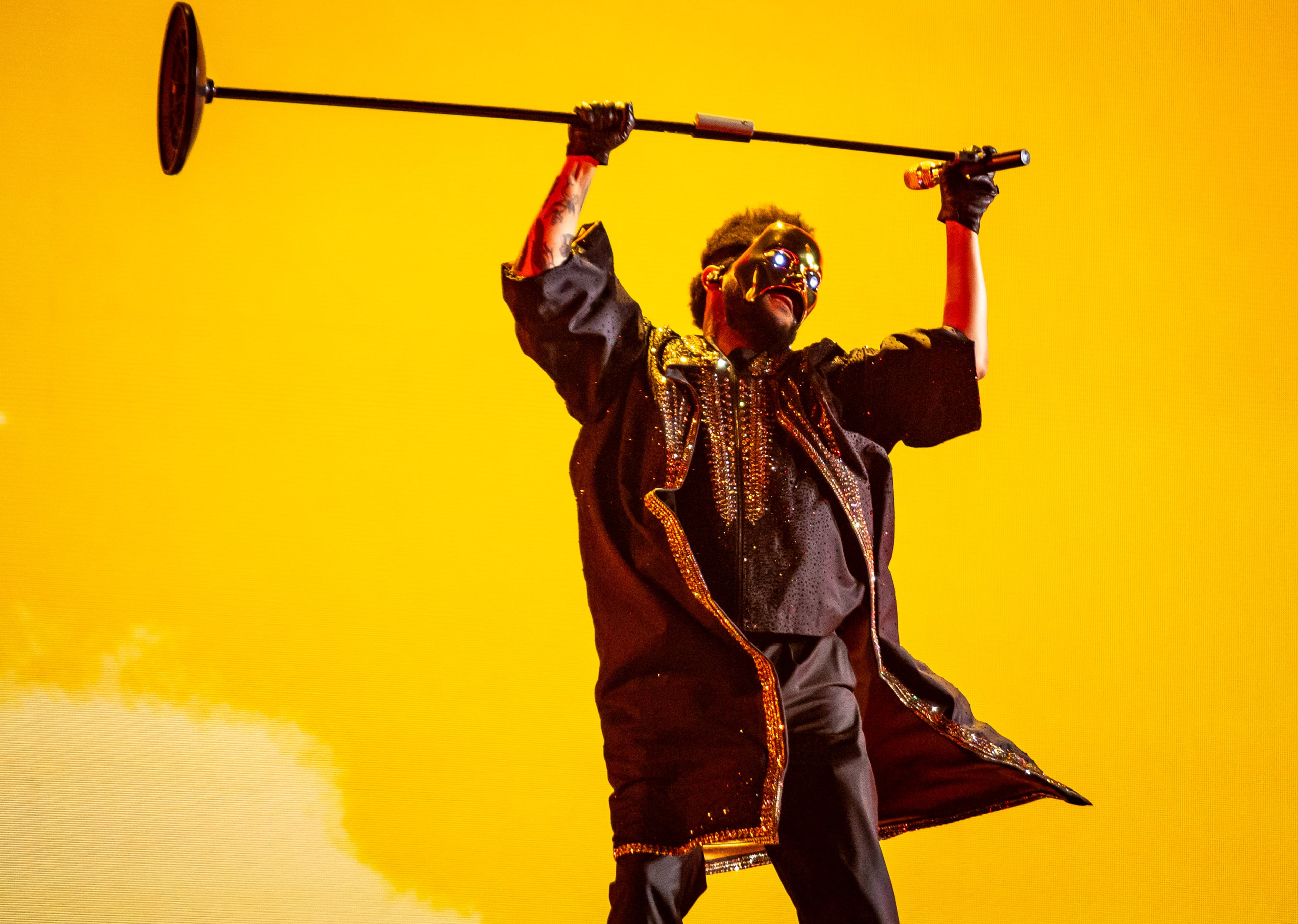 Thursday's concert felt like part EDM, part apocalyptic, part pop regalia and part seductive — forming a stunning display of The Weeknd’s expansive, dark universe. (Ryan Fleisher for the AJC)