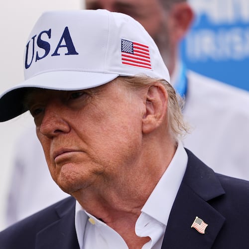 U.S. President Donald Trump attends the Irish Open golf tournament at Trump International Golf Links in Doonbeg, Ireland, Sunday, Sept. 13, 2026. (AP Photo/Julia Demaree Nikhinson)