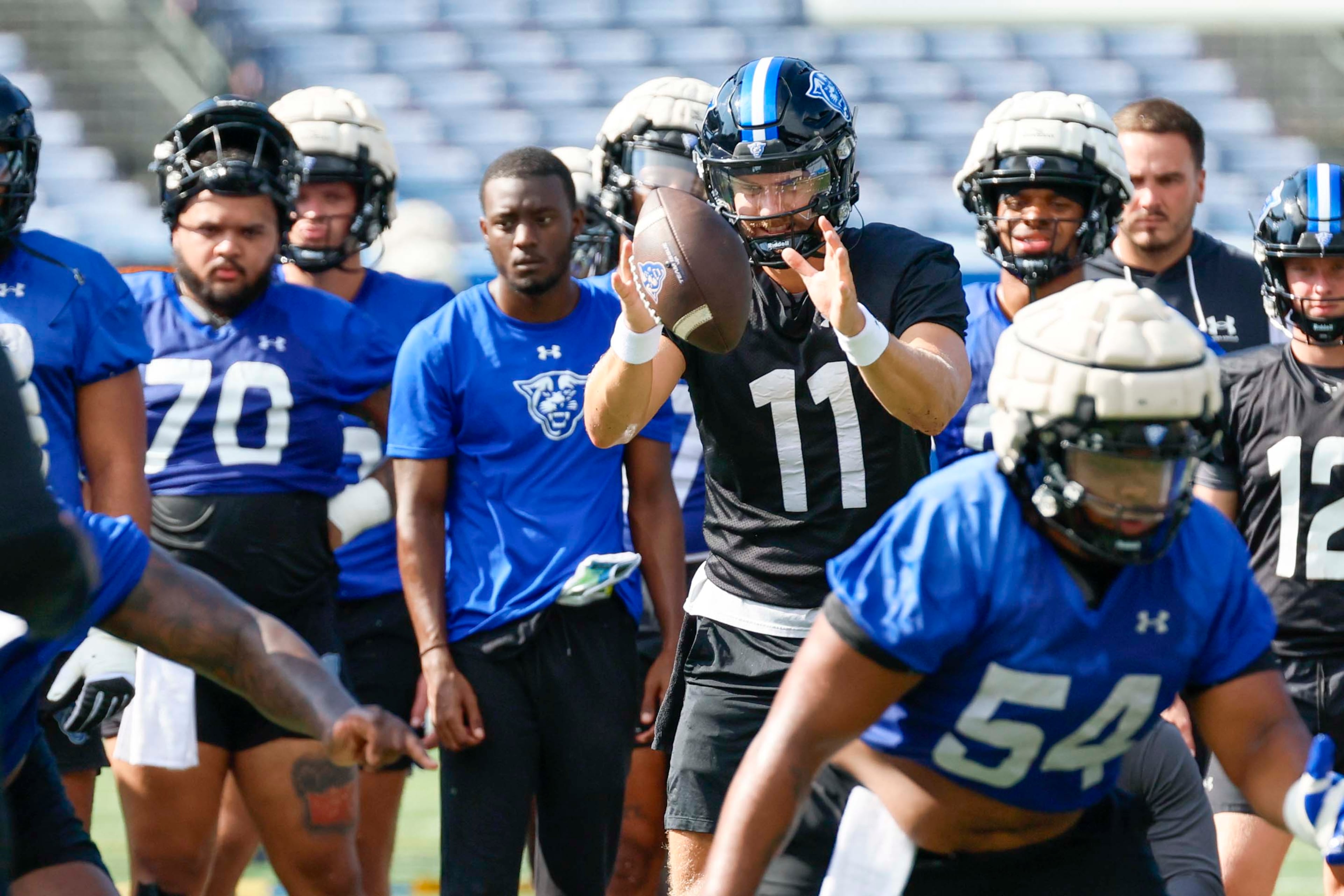 GSU quarterback Christian Veilleux (11) works on a play during Georgia State University’s first day of practice at Center Parc Stadium on Thursday, July 31, 2025, in Atlanta.
(Miguel Martinez/ AJC)