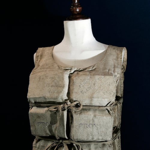 FILE - A Titanic life-preserver, belong to a survivor is shown, London, Wednesday, May 16, 2007. ((AP Photo/Sang Tan)