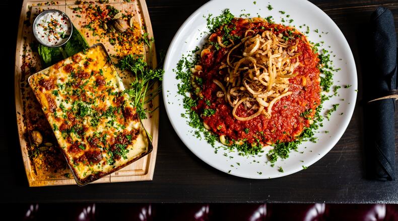 You can enjoy some carbs at Pharaohs Palace with koshari (right), the national dish of Egypt, or Macaroni Béchamel (left). CONTRIBUTED BY HENRI HOLLIS