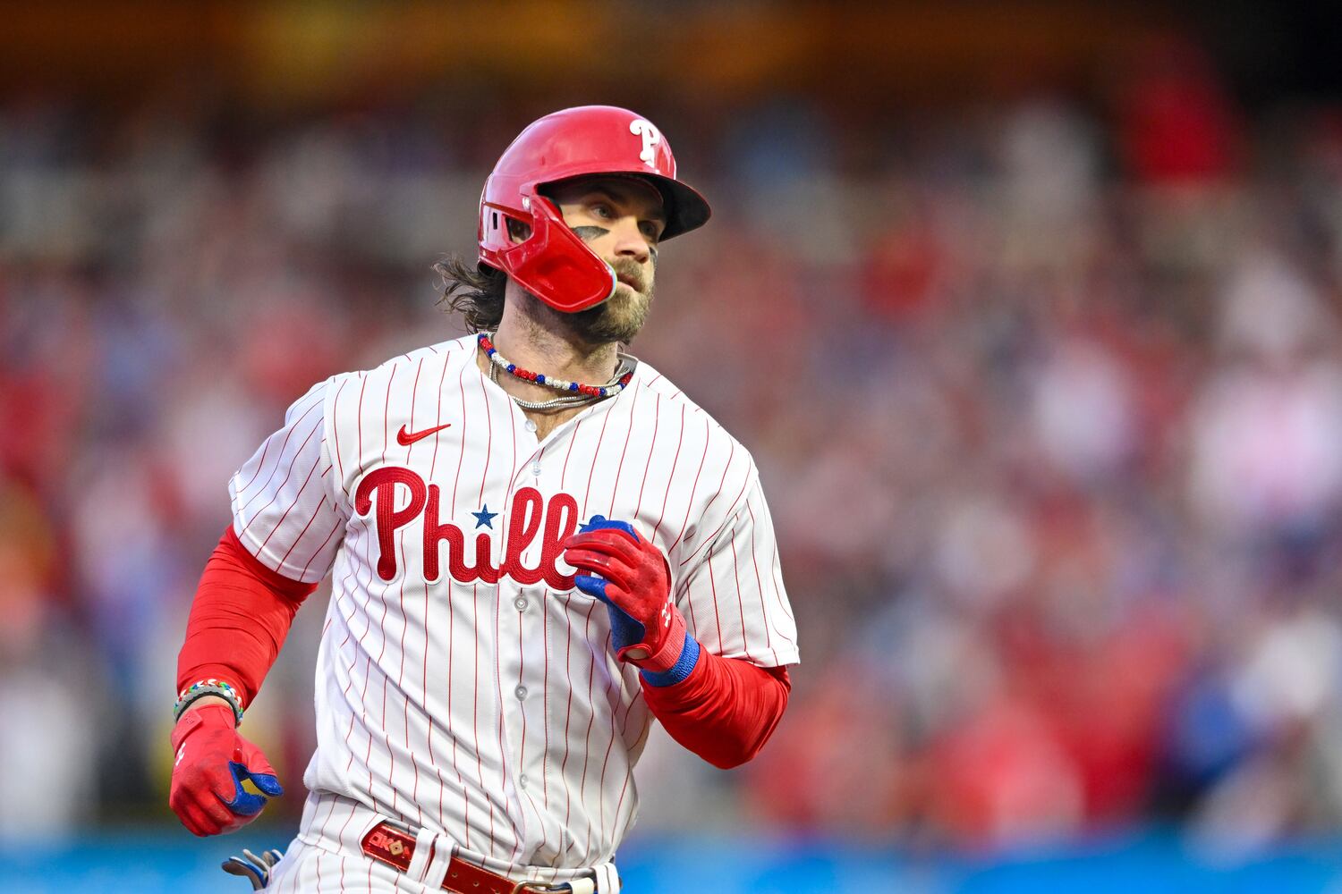 Philadelphia Phillies’ Bryce Harper (3) runs the bases after a 3-RBI home run against the Atlanta Braves that scored Brandon Marsh and Trea Turner during the third inning of NLDS Game 3 in Philadelphia on Wednesday, Oct. 11, 2023.   (Hyosub Shin / Hyosub.Shin@ajc.com)