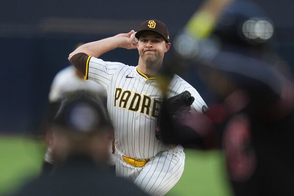 San Diego Padres starting pitcher Michael King works against a Cleveland Guardians batter during the first inning of a baseball game Tuesday, April 1, 2025, in San Diego. (AP Photo/Gregory Bull)