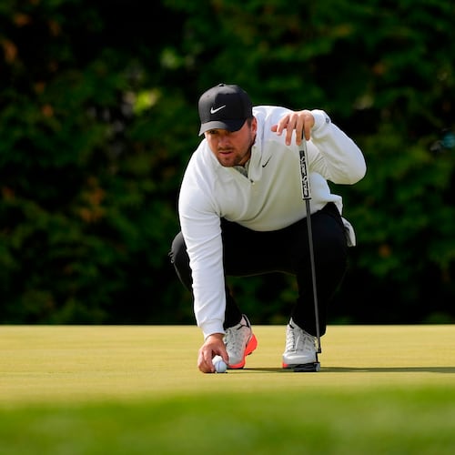 Chris Gotterup lines up his ball on the 12th green during the second round of the PGA Championship golf tournament at Aronimink Golf Club, Friday, May 15, 2026, in Newtown Square, PA. (AP Photo/Carolyn Kaster)