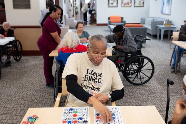 Willie Barnett, 80, plays bingo with other residents at A.G. Rhodes Atlanta on Friday, April 11, 2025. He has lived here for three years. A.G. Rhodes' facilities in Atlanta is not on Brown's list of nursing homes at risk of closing.  But according to analysis, all nursing homes may be affected by spending cuts in the "Big, Beautiful Bill." (Ben Gray for the AJC)