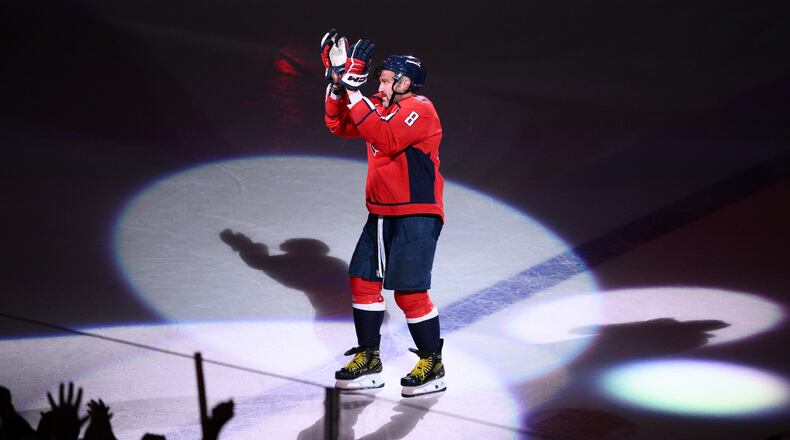 FILE - Washington Capitals left wing Alex Ovechkin reacts after he was named the first star after an NHL hockey game against the Pittsburgh Penguins, April 12, 2026, in Washington. (AP Photo/Nick Wass, File)