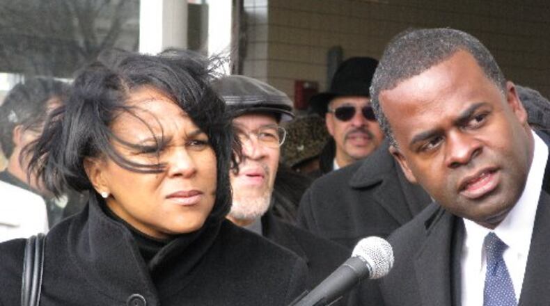 Rosalind G. Brewer is shown with Atlanta Mayor Kasim Reed during a 2010 news conference to discuss Walmart expansion plans. AJC file photo/Arielle Kass