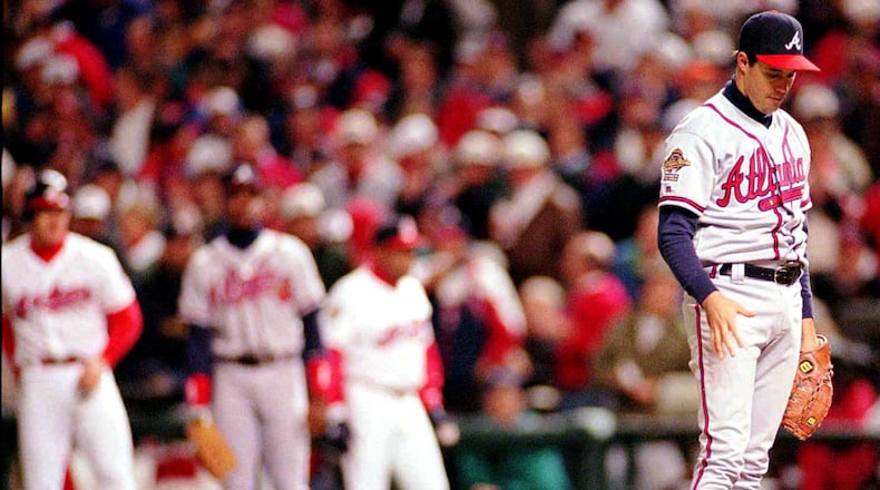 Braves pitcher Greg Maddux reacts to a allowing a run for the Cleveland Indians in the sixth inning of Game 5 of the 1995 World Series, Oct. 26, 1995, in Cleveland.