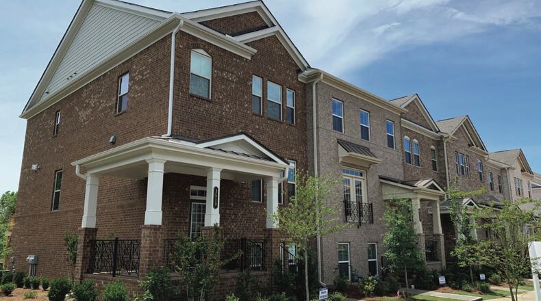 Lawrenceville recently approved zoning changes to allow for a 63-unit townhouse development along the southern right-of-way of Gwinnett Drive, east of Scenic Highway that will be similar in style to these townhomes in Duluth built by the same developer. (Courtesy City of Lawrenceville)
