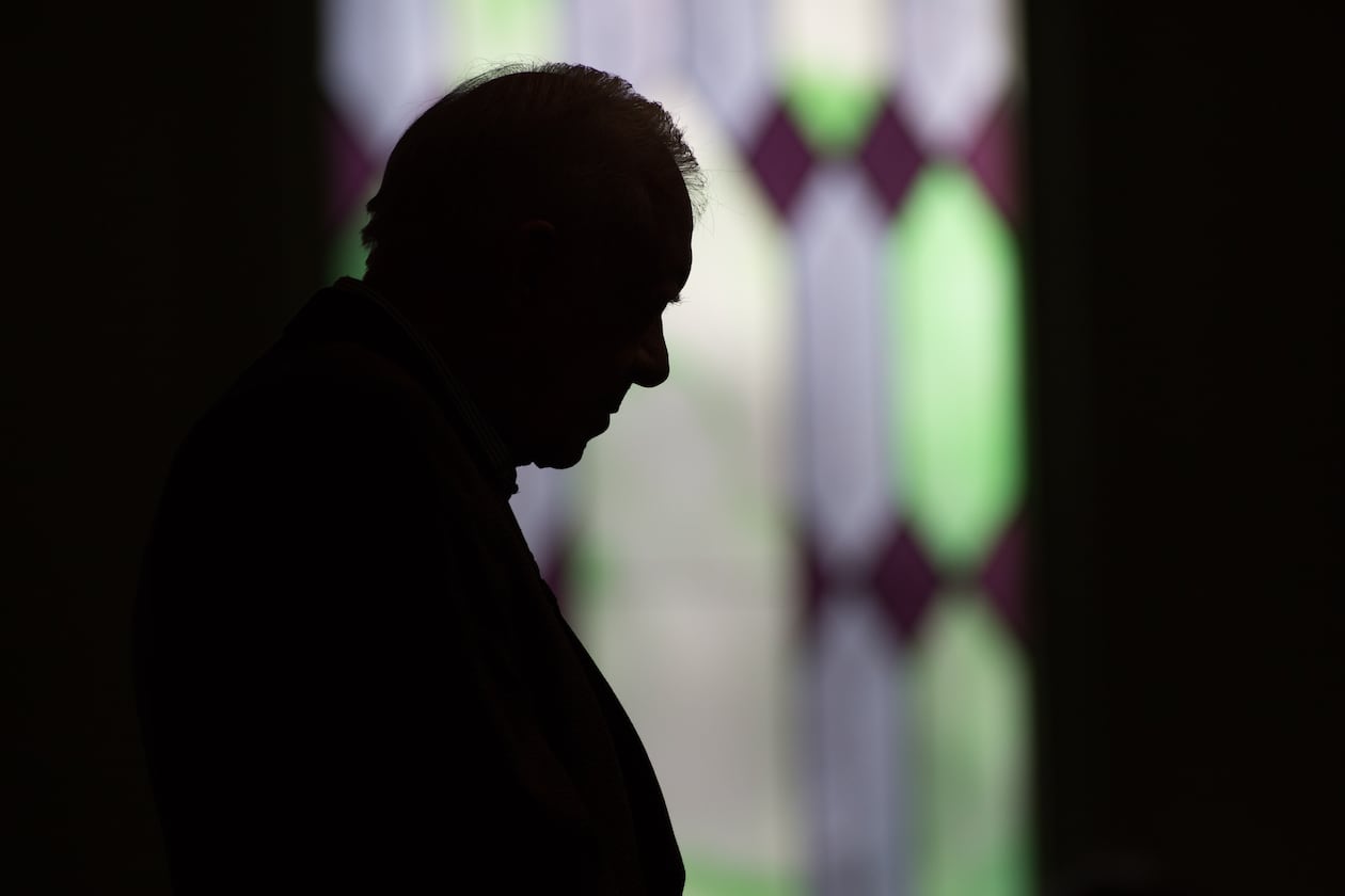 Former President Jimmy Carter prays during Sunday School class at Maranatha Baptist Church in Plains, Ga., in 2015. Carter was a lifelong Sunday school teacher and drew thousands from around the world to his tiny hometown to listen to him. (AP Photo/Branden Camp)