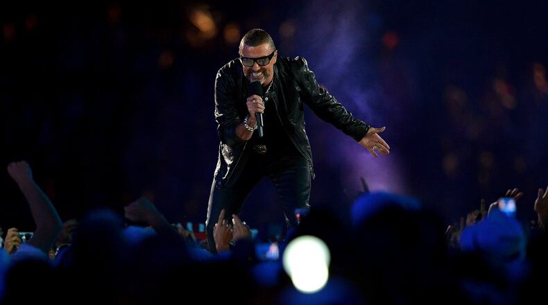 LONDON, ENGLAND - AUGUST 12: George Michael performs during the Closing Ceremony on Day 16 of the London 2012 Olympic Games at Olympic Stadium on August 12, 2012 in London, England. (Photo by Jeff J Mitchell/Getty Images)