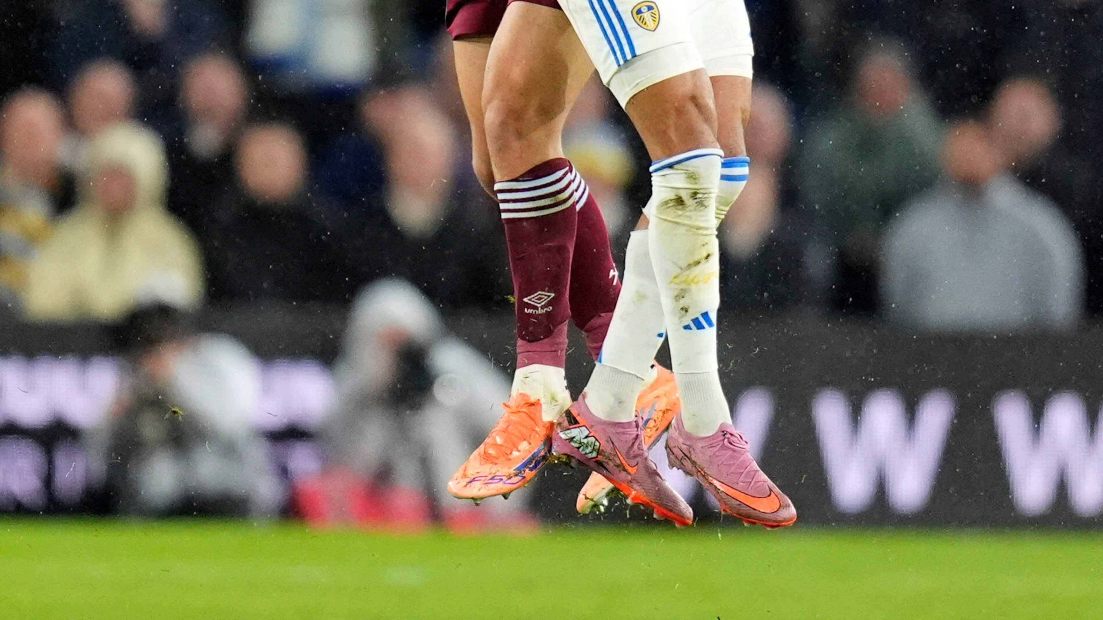 West Ham United's Max Kilman, rear, and Leeds United's Dominic Calvert-Lewin in action during the English Premier League soccer match between Leeds United and West Ham United at Elland Road, Leeds, England, Friday Oct. 24, 2025. (Danny Lawson/PA via AP)