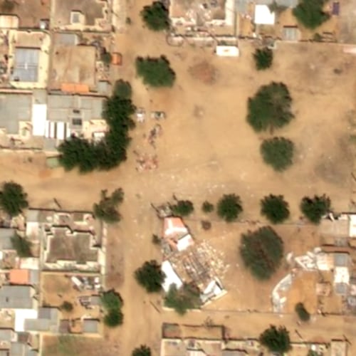 This satellite image taken by Airbus DS shows objects on the ground near what are likely Rapid Support Forces vehicles in the Daraja Oula neighborhood of el-Fasher, Sudan, Monday, Oct. 27, 2025. (Airbus DS 2025 via AP)