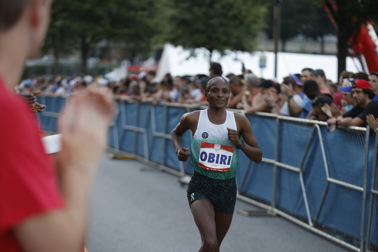 Elite division runner Hellen Obiri starts the 56th running of The Atlanta Journal-Constitution Peachtree Road Race in Atlanta on Friday, July 4, 2025.   (Arvin Temkar/AJC)