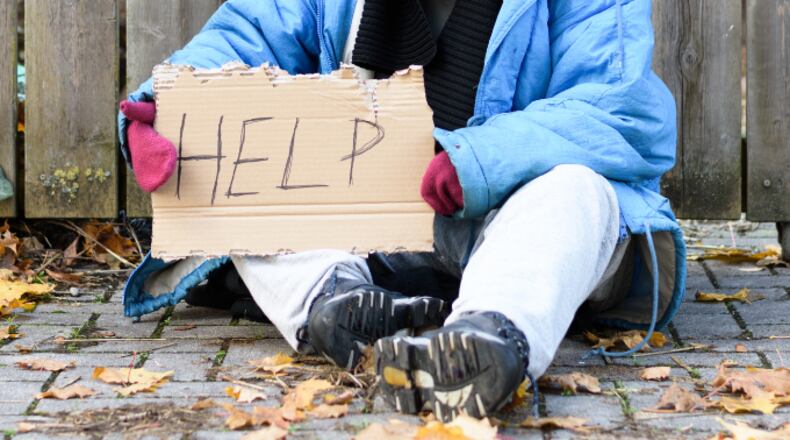 Homeless woman (stock photo).