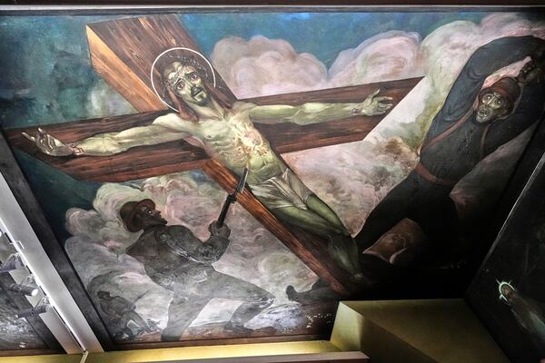 A mural by Croatian-American artist Maxo Vanka titled "Christ on the Battlefield" is seen inside St. Nicholas Croatian Catholic Church in Millvale, Pa., Tuesday, March 18, 2025. (AP Photo/Gene J. Puskar)