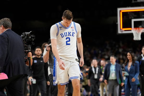Duke's Cooper Flagg (2) walks off the court after Duke lost to Houston in the national semifinals at the Final Four of the NCAA college basketball tournament, Saturday, April 5, 2025, in San Antonio. (AP Photo/Eric Gay)