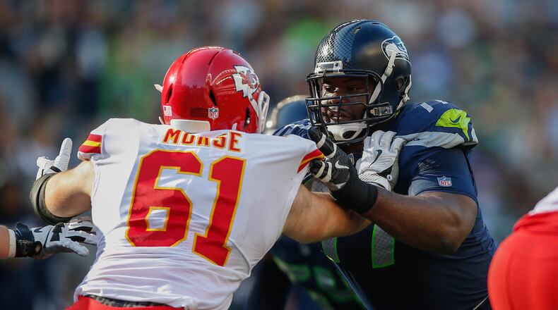 Defensive tackle Ahtyba Rubin of the Seahawks battles Mitch Morse of the Chiefs at CenturyLink Field on August 25, 2017 in Seattle.