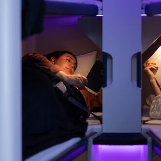 This photo provided by Air New Zealand shows sleeping pods in a mock-up of a plane cabin in Auckland, New Zealand. (Air New Zealand via AP)