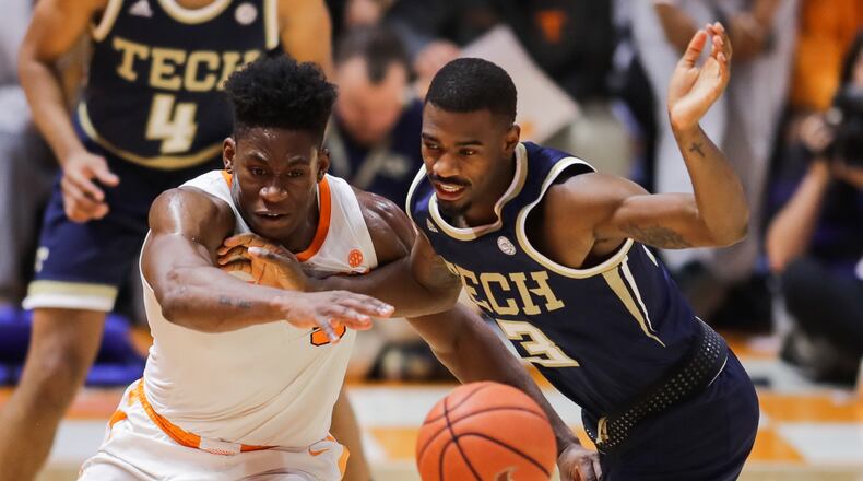 KNOXVILLE, TN - NOVEMBER 13: Admiral Schofield #5 of the Tennessee Volunteers and Curtis Haywood II #13 of the Georgia Tech Yellow Jackets go after a loose ball at Thompson-Boling Arena on November 13, 2018 in Knoxville, Tennessee. Tennessee won the game 66-53. (Photo by Donald Page/Getty Images)