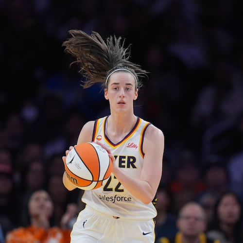 Indiana Fever guard Caitlin Clark (22) dribbles during the first half of a WNBA basketball game against the Los Angeles Sparks Wednesday, May 13, 2026, in Los Angeles. (AP Photo/Jae C. Hong)