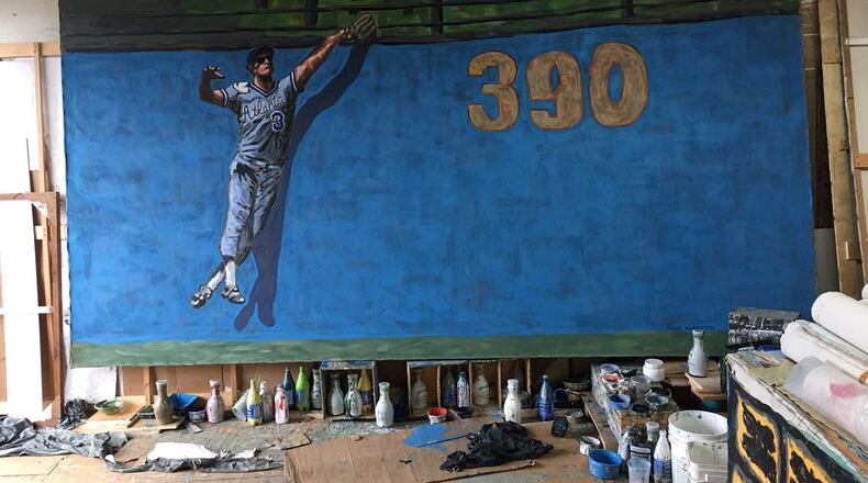 This is one of the largest of the 300 pieces of art that will be displayed at SunTrust Park. It's by John Robertson of Malibu, California, depicting Dale Murphy leaping to rob a home run.