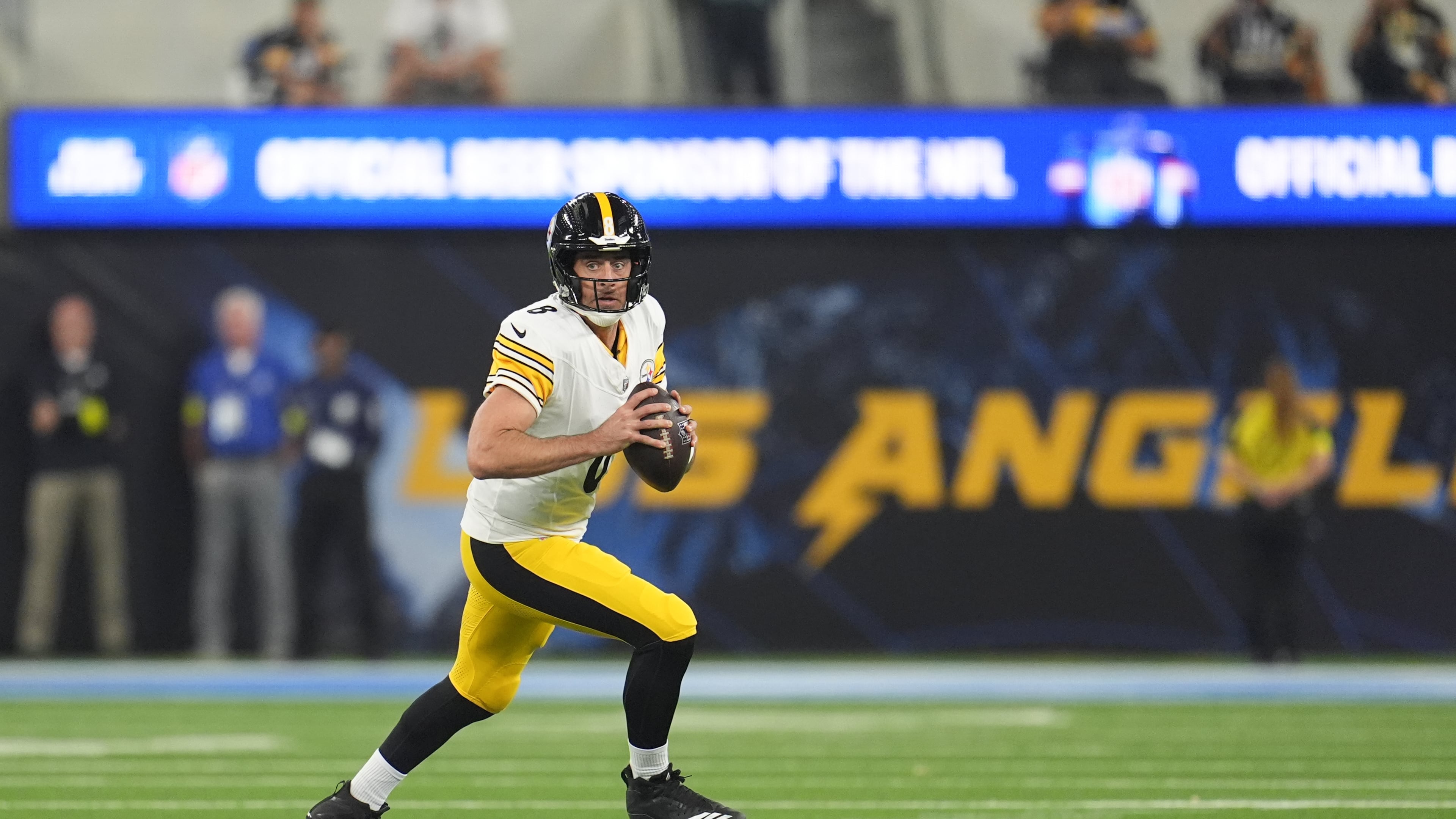 Pittsburgh Steelers quarterback Aaron Rodgers (8) pulls back to throw a pass during the first half of an NFL football game against the Los Angeles Chargers Sunday, Nov. 9, 2025, in Inglewood, Calif. (AP Photo/Marcio Jose Sanchez)