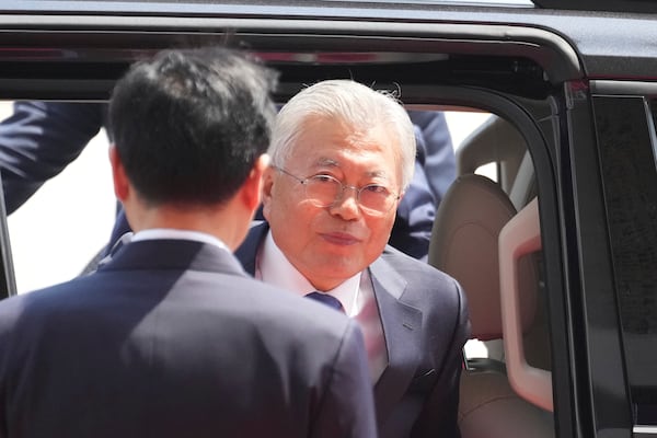 South Korean former President Moon Jae-in gets out of a car upon his arrival at National Assembly in Seoul, South Korea, Friday, April 25, 2025. (AP Photo/Lee Jin-man)