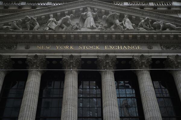 The exterior of the New York Stock Exchange is seen shortly after the close of the market, Wednesday, April 2, 2025. (AP Photo/Patrick Sison)