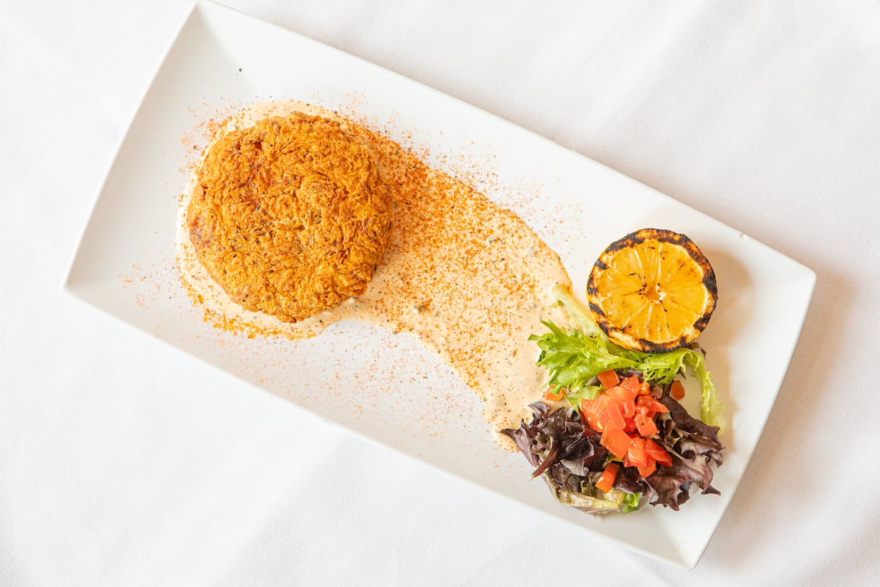 Crawfish cakes are one of Cherokee Rose Restaurant's most popular menu items. (Aaliyah Man for the AJC)