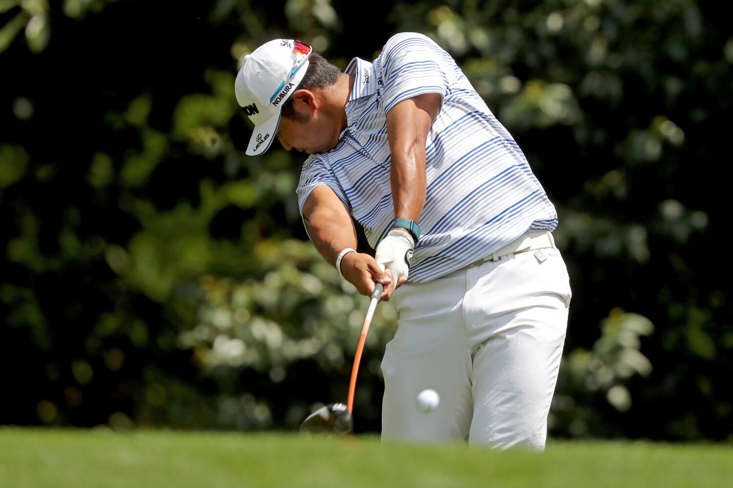 April 8, 2021, Augusta: Hideki Matsuyama hits his tee shot on the eleventh hole during the first round of the Masters at Augusta National Golf Club on Thursday, April 8, 2021, in Augusta. Curtis Compton/ccompton@ajc.com