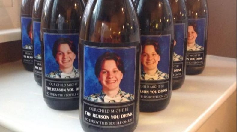 An Ohio couple gave teachers wine for Christmas with homemade labels featuring thier son’s face, saying they needed something a little stonger than a mug for coffee.