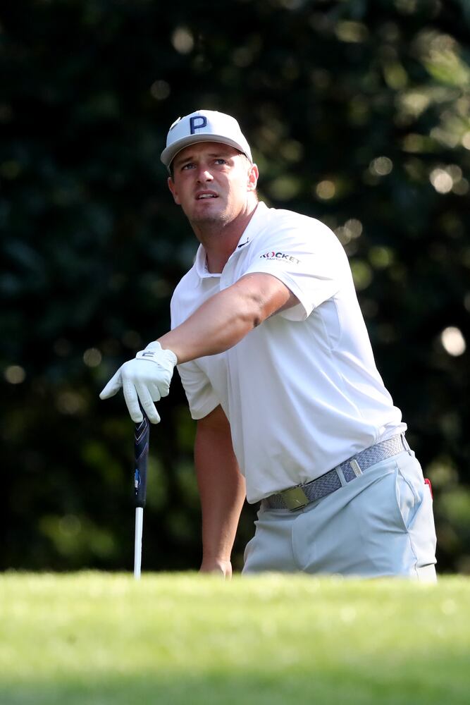 April 7, 2021, Augusta: Bryson DeChambeau watches his tee shot on the eleventh hole during his practice round for the Masters at Augusta National Golf Club on Wednesday, April 7, 2021, in Augusta. Curtis Compton/ccompton@ajc.com
