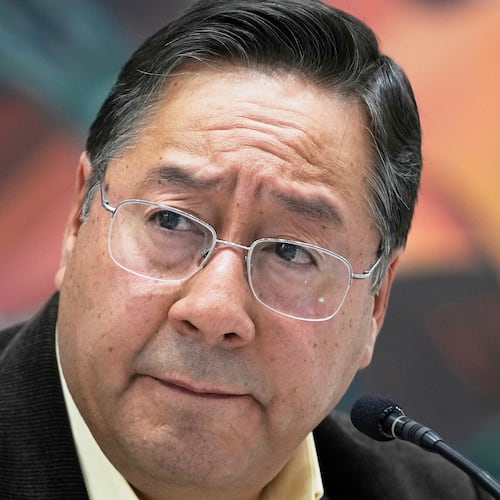 FILE - Bolivia's President Luis Arce listens to questions during a press conference at the presidential palace in La Paz, Bolivia, Aug. 21, 2025. (AP Photo/Juan Karita, File)