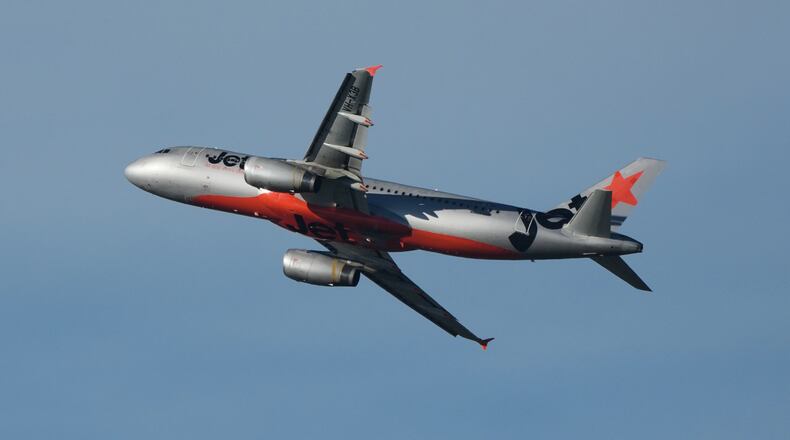 A Jetstar passenger jet takes off from Sydney Airport in Sydney, Tuesday, July 21, 2026. (AP Photo/Mark Baker)