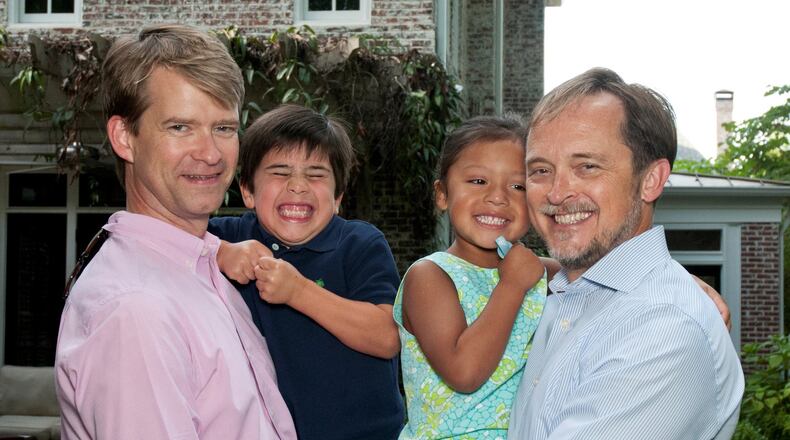 Shane Thomas (right) and Michael Bishop with their children Thomas and Mariella. Thomas and Bishop are domestic partners and have been together for almost 10 years.