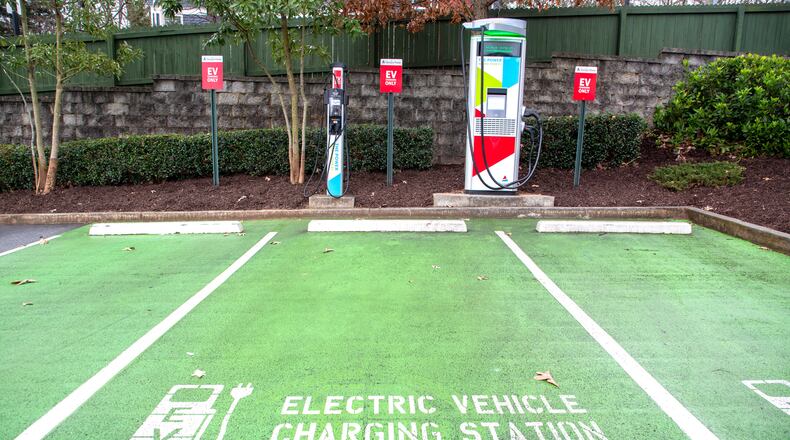 An EV charging station for electric vehicles is located in the parking lot of Krog Street Market on Thursday, February 17, 2022. STEVE SCHAEFER FOR THE ATLANTA JOURNAL-CONSTITUTION