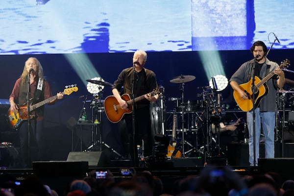 Don Henley (center), Deacon Frey (right) and Timothy B. Schmit perform during the Long Goodbye Act III tour at Truist Park.  (Miguel Martinez/AJC)