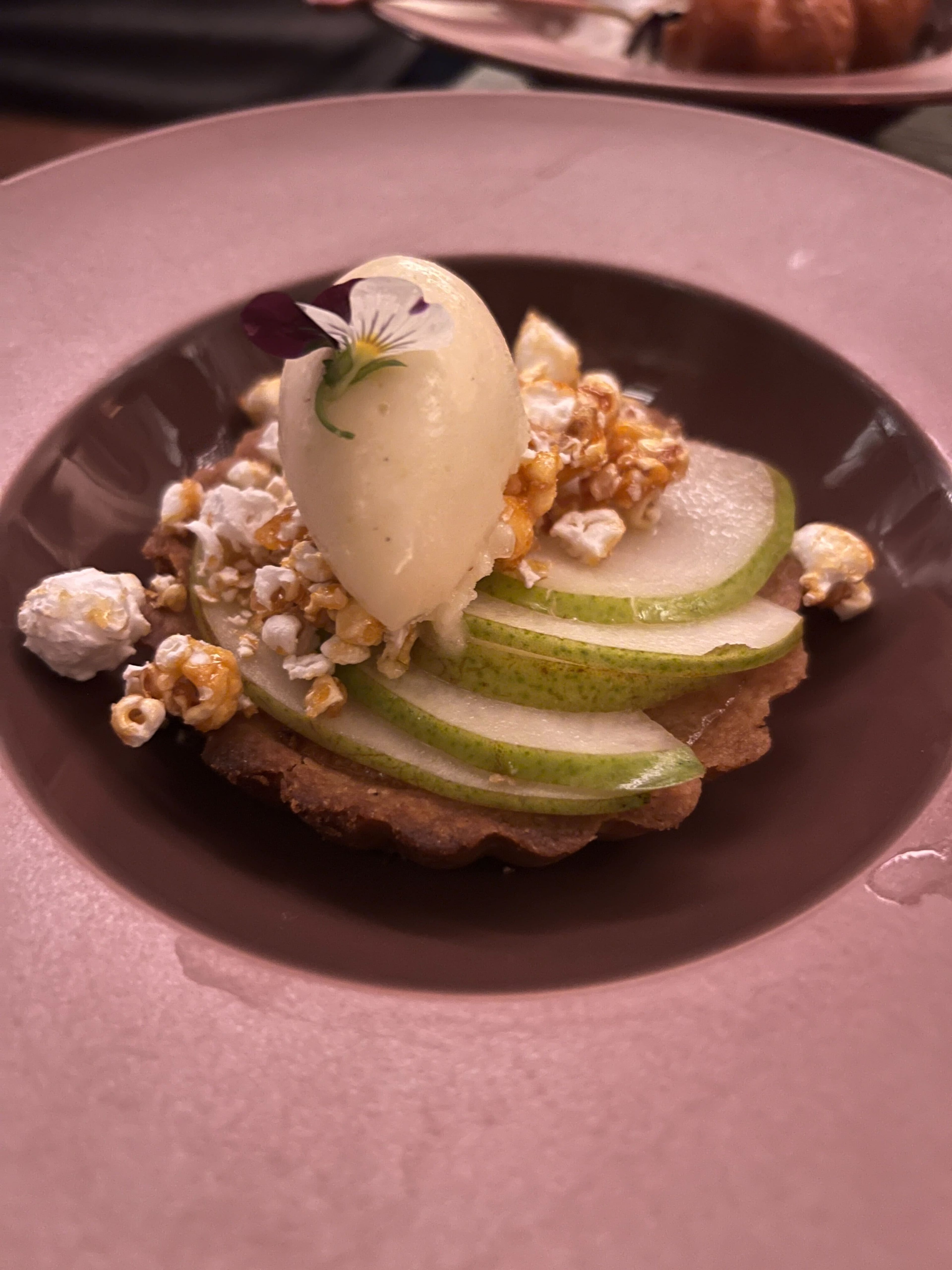 The quesillo shortbread tart is one of the plated desserts on the menu at Bar Ana, a dessert and cocktail bar from pastry chef Claudia Martinez. (Mike Jordan/AJC)